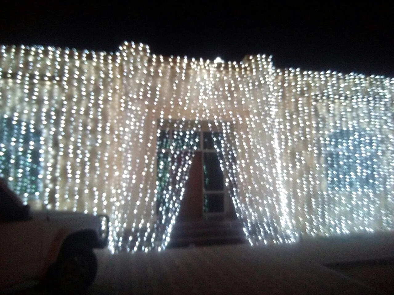 UAE flag-colour drape lighting