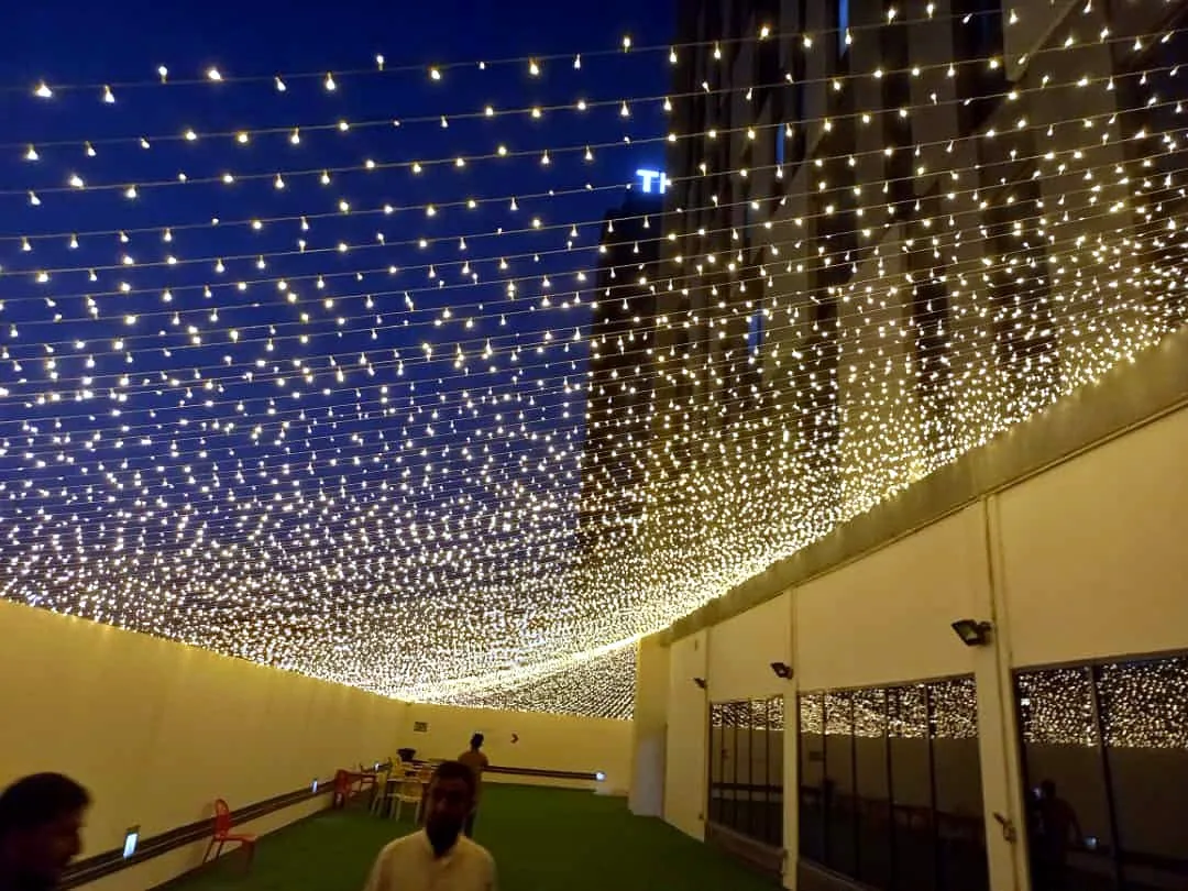 Pergola icicle lighting over seating